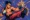 A modern and minimalistic Gen Z-style digital illustration of a muscular martial artist delivering a dynamic combo move, inspired by Victor from Tekken 8, with vibrant colors and bold graphic elements in a 16:9 ratio.